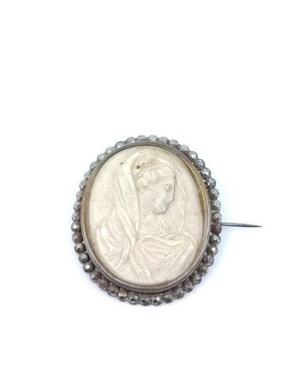 Cameo spindle on limestone concretion representing...