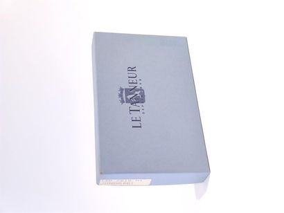 THE TANNER
Black leather wallet, gold-plated...