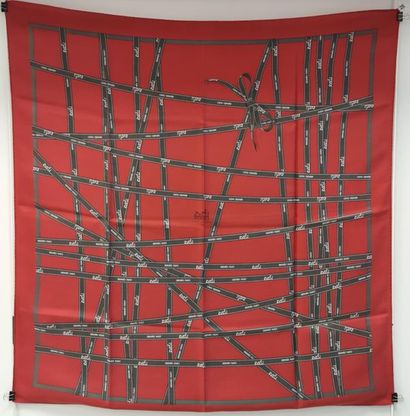 HERMES
Square in silk twill on carmine red...