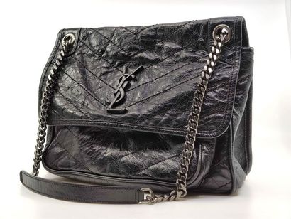 YVES SAINT LAURENT
Black leather bag, black...