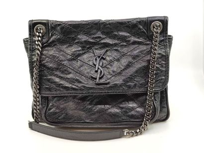 YVES SAINT LAURENT
Black leather bag, black...