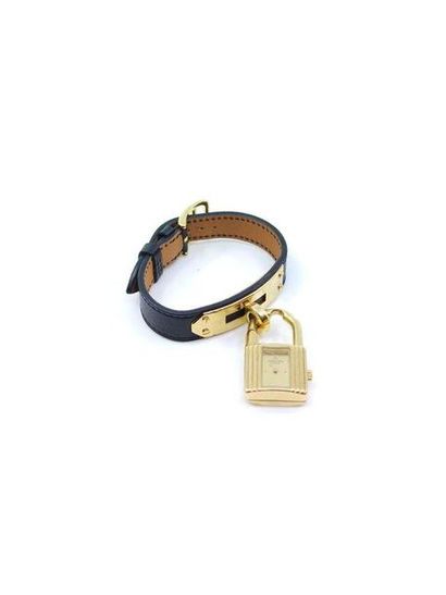 HERMES
Kelly bracelet watch, gold metal padlock,...