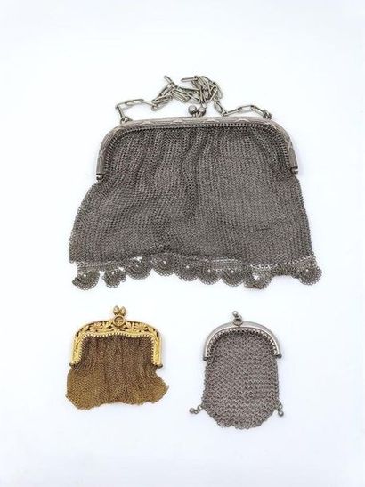 LOT including:
Evening bag in silver metal
Purse...