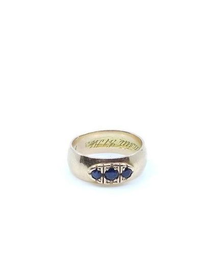 Yellow gold garter ring with three sapphires...