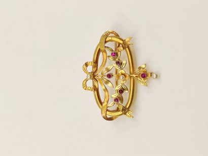 BROCHE en or jaune 750° et vert ornée de...