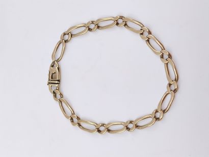 BRACELET en or jaune 750° maille gourmette

Poids...