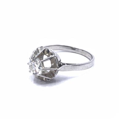 BIJOU NEUF

Solitaire en or gris 750° orné...