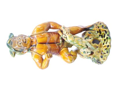 ASIA

TWO polychrome sandstone subjects representing...