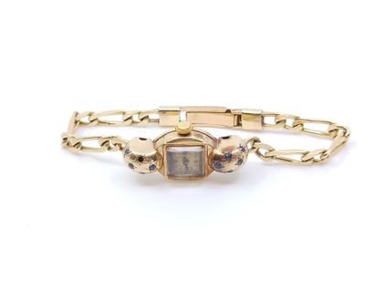 MONTRE BRACELET de dame en or jaune 750°...