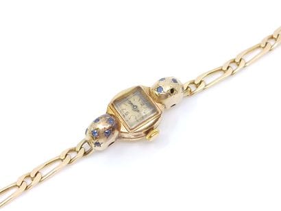 MONTRE BRACELET de dame en or jaune 750°...