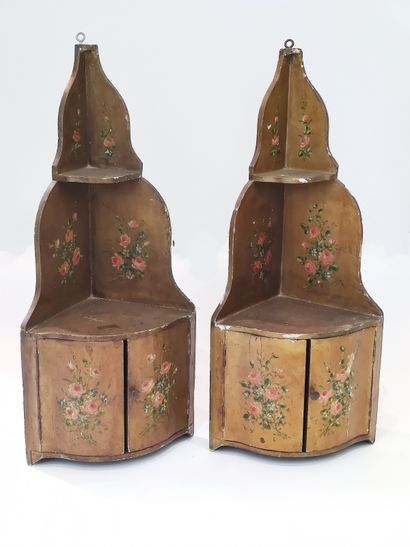 Pair of corner shelves each opening with...