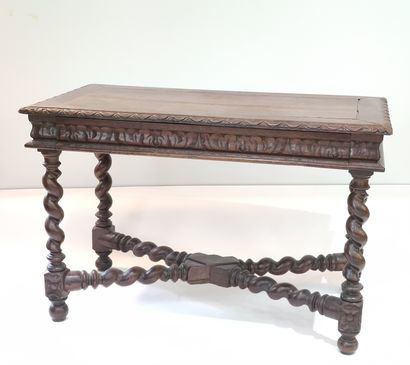 BUREAU en chêne sculpté et mouluré, à colonne...