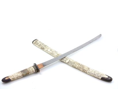 JAPAN MEIJI

Carved ivory and bone katana...