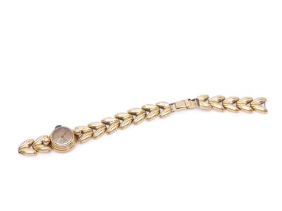 MONTRE bracelet de dame en or jaune 750°...