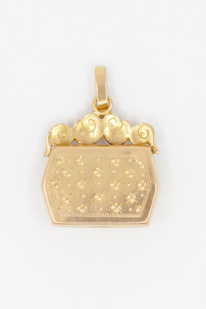 PENDENTIF porte-souvenir en or jaune 750°...
