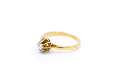 BAGUE solitaire en or deux tons 750° ornée...