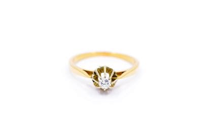 BAGUE solitaire en or deux tons 750° ornée...