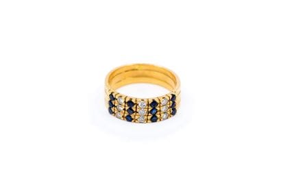 BAGUE en jaune 750° ornée de trois ligne...