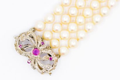 
BRACELET QUATRE lignes de perles, fermoir...