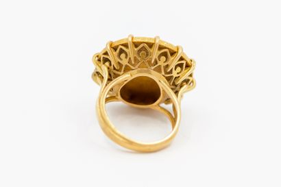BAGUE en or jaune 750° ornée d'une pièce...