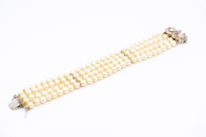 
BRACELET QUATRE lignes de perles, fermoir...