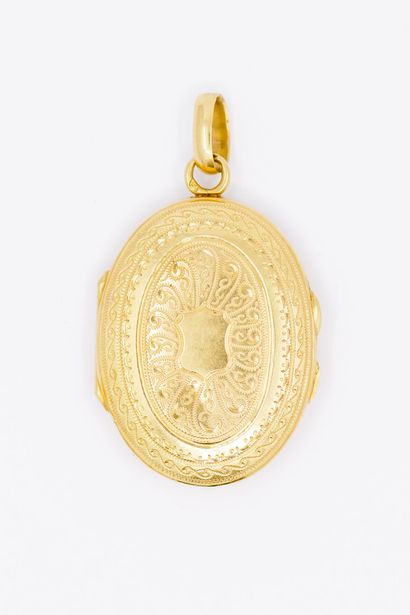 PENDENTIF porte souvenir or 750° finement...
