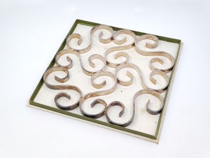 CHRISTOFLE

Repose plat de forme arabesque

Dans...