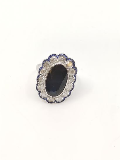 BAGUE pompadour ornée de saphir en serti...