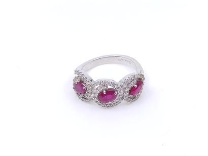 BAGUE en or gris 750 ° formant des entrelacs...
