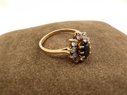 
BAGUE marguerite en or jaune 750° ornée...
