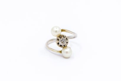 BAGUE en or gris 750° ornée d'un diamant...