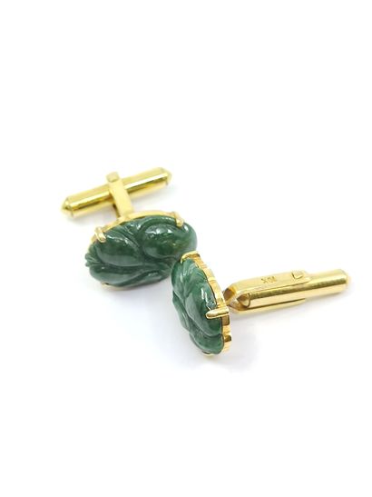 PAIRE DE boutons de manchette en or 14 kt...