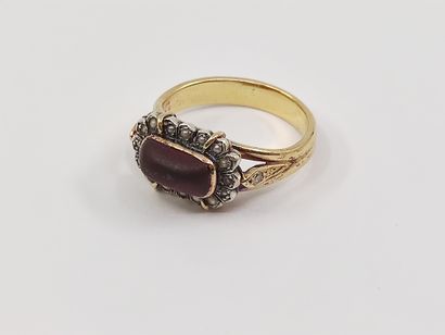 BAGUE en or jaune 750° et argent sertie d'un...