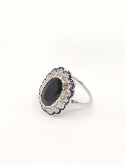 BAGUE pompadour ornée de saphir en serti...