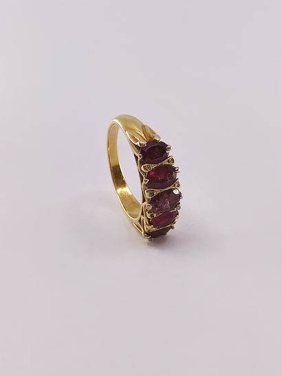 BAGUE jarretière en or jaune 750° ornée de...