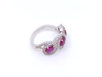 BAGUE en or gris 750 ° formant des entrelacs...