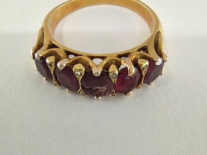 BAGUE jarretière en or jaune 750° ornée de...