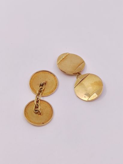 PAIRE de boutons de manchette en or jaune...