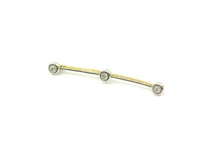 BROCHE barette en or et argent 750° ornée...