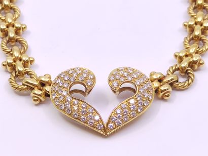 COLLIER en or jaune 750° ornée d'un pendentif...