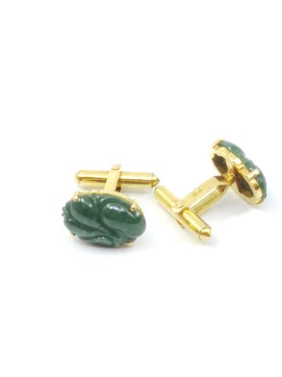 PAIRE DE boutons de manchette en or 14 kt...