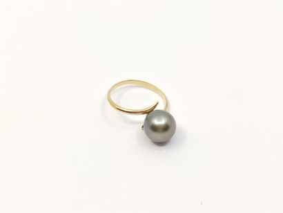 BAGUE en or jaune et perle de Tahiti

Poids...