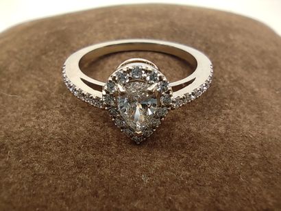 
BAGUE en or gris 750° ornée d'un diamant...