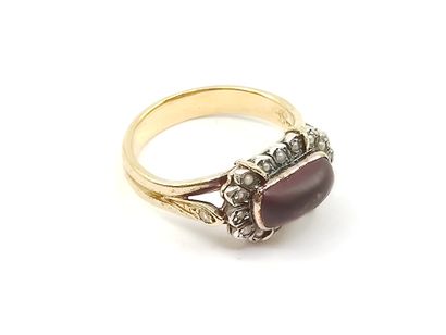 BAGUE en or jaune 750° et argent sertie d'un...