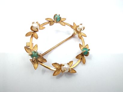 
Broche en or jaune 750 ornée de perles et...