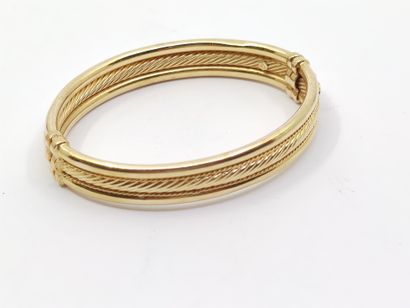 BRACELET en or jaune 585° jonc ouvrant

Poids...