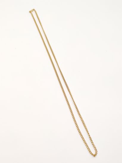 
CHAINE en or jaune 750° et bracelet gourmette...