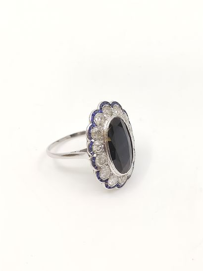 BAGUE pompadour ornée de saphir en serti...
