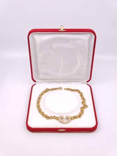 COLLIER en or jaune 750° ornée d'un pendentif...