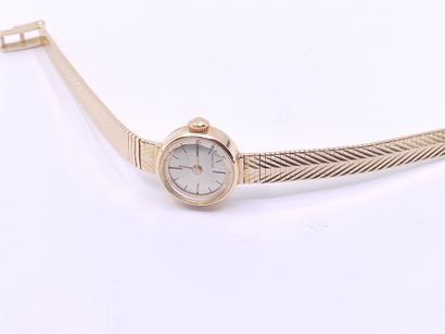 SUIZEX

Montre bracelet de dame en or jaune...